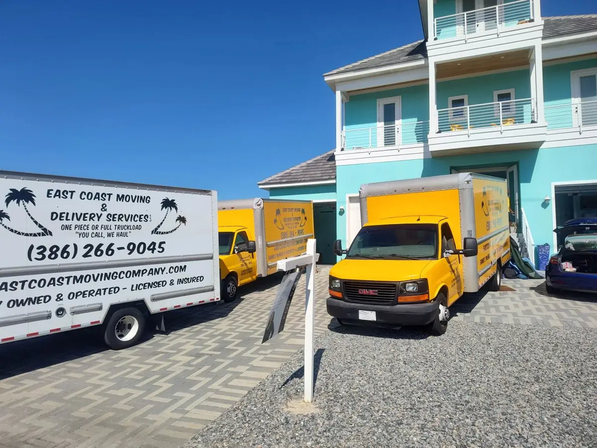 East Coast Moving truck at a raised beach house